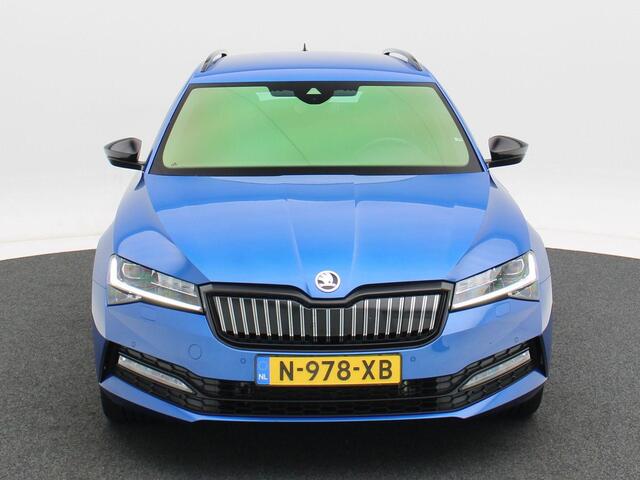Skoda SUPERB Combi 1.4 TSI iV 218 Pk Automaat Sportline Business | Trekhaak | Full LED | Canton Audio | Carplay | Camera | Parkeersensoren | Navigatiesysteem | Stoel Verwarming | Elektrische Achterklep | 19 Inch | 43.469 Km