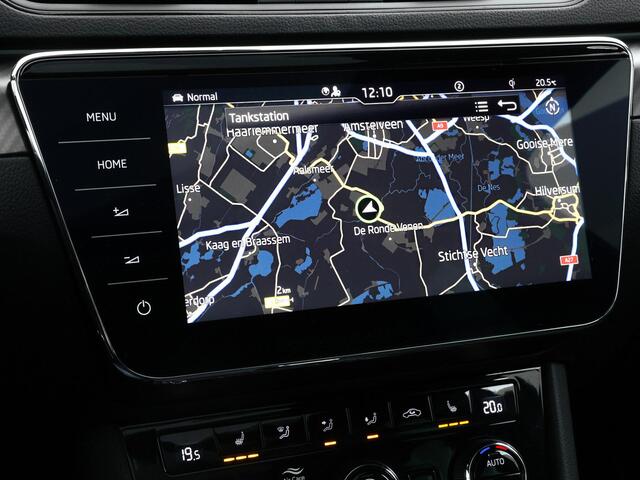 Skoda SUPERB Combi 1.4 TSI iV 218pk DSG Sportline Business · Panoramadak · 360 Camera · Inklap. Trekhaak · Matrix LED · Canton Audio · Elek. Stoelen + Geheugen ·