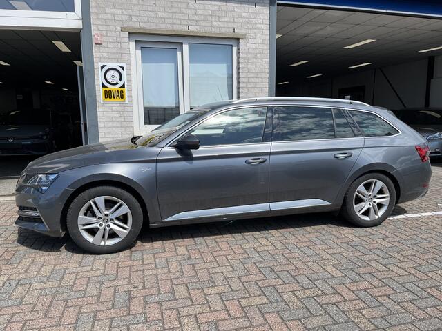 Skoda SUPERB Combi 1.4 TSI iV Laurin & Klement / AUTOMAAT/ 218 PK/ CANTON AUDIO/ CAMERA/ DCC/ CRYSTAL LIGHTING/ DODE HOEK/ STOELVENTILATIE/ MEMORY SEATS/ VOORRUIT VERWARM./ STOELVERWARM. V&A/ SMARTLINK/ KEYLESS/ ADAPT. CRUISE/ NAVI/ CLIMA