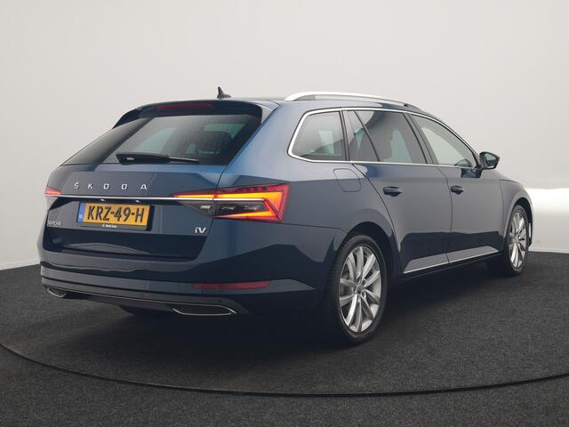 Skoda SUPERB Combi 1.4 TSI iV Laurin & Klement PHEV 218pk Dealer O.H. | Trekhaak Af Fabriek | Adaptive Cruise | Camera | Lederen Comfortzetels Memory & Verwarmd | Stuur Verwarmd | Canton Audio | Blis | Keyless | Apple Carplay | Crystal LED | Navigatie | DAB | Plug In Hybrid |