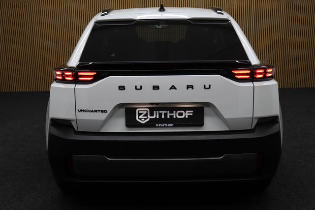 Subaru Uncharted 2E-xcite+ 77 kWh | Harman Kardon Audio | Adaptive-cruise | 360° Camera | Clima | Navigatie | Leder | Apple Carplay & Android Auto | Parkeerhulp | Stoel & Stuurverwarming | Elek. Achterklep | Keyless | Dodehoekdetectie