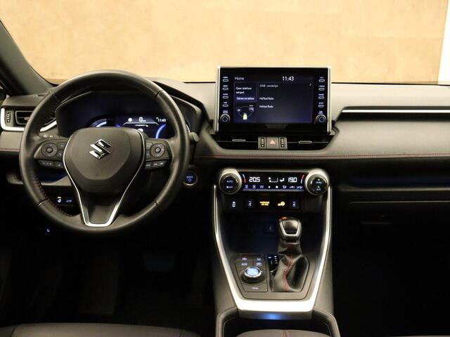 Suzuki Across 2.5 Plug-in Hybrid Style - ADAPTIEVE CRUISE CONTROL - AFNEEMBARE TREKHAAK (TREKGEWICHT 1500 KG GEREMD) - DODEHOEKDETECTIE - STOELVERWARMING VOOR + ACHTER - APPLE CARPLAY/ANDROID AUTO - EXTRA GETINT GLAS - STUURWIELVERWARMING