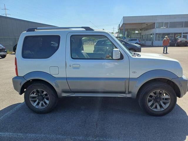 Suzuki JIMNY 1.3 EXCLUSIVE 4WD Trekhaak | Leder | Airco | Lichtmetalen velgen