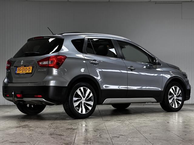 Suzuki S-Cross 1.0 Boosterjet High Executive/ Trekhaak/ Panorama-Dak/ Camera/ Apple + Android/ Leder/ Adaptive Cruise/ LED Koplampen/ Keyless/ Extra getint glas/ PDC V+A/ Navi/ Stoelverw./ Bluetooth/ Multi. LEDER. Stuur.