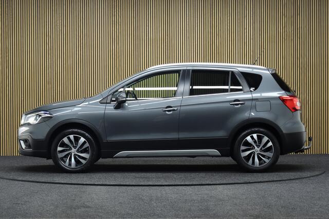 Suzuki S-Cross 1.4 Boosterjet AllGrip Style Smart Hybrid | Elek. Glazen Panoramadak | Adaptive-cruise | Afneembare Trekhaak | Leder | Camera | Clima | Parkeerhulp | Apple Carplay & Android Auto | Navigatie | Keyless | Stoelverwarming