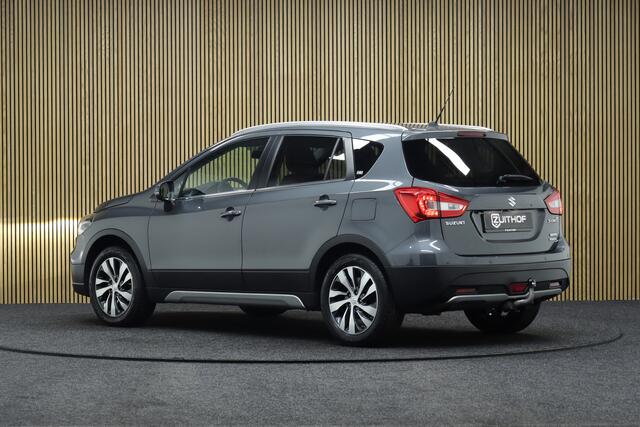 Suzuki S-Cross 1.4 Boosterjet AllGrip Style Smart Hybrid | Elek. Glazen Panoramadak | Adaptive-cruise | Afneembare Trekhaak | Leder | Camera | Clima | Parkeerhulp | Apple Carplay & Android Auto | Navigatie | Keyless | Stoelverwarming