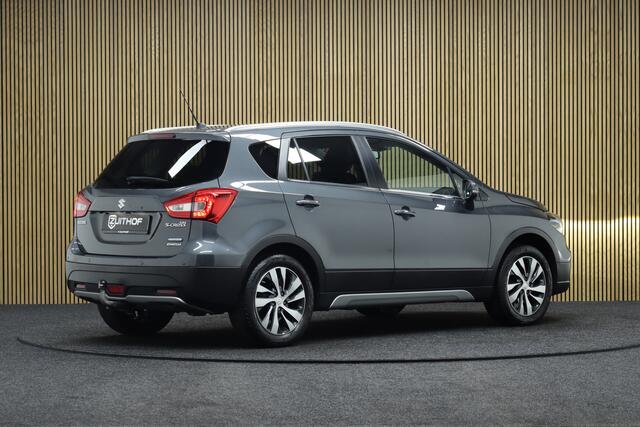 Suzuki S-Cross 1.4 Boosterjet AllGrip Style Smart Hybrid | Elek. Glazen Panoramadak | Adaptive-cruise | Afneembare Trekhaak | Leder | Camera | Clima | Parkeerhulp | Apple Carplay & Android Auto | Navigatie | Keyless | Stoelverwarming