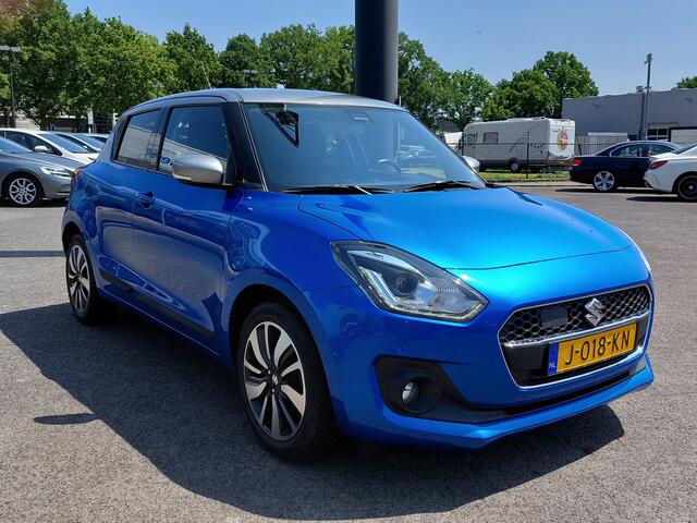Suzuki SWIFT 1.0 BoosterJet 111pk Smart Hybrid Stijl | Navi | Clima | Adap.Cruise | Led Koplampen | Keyless Entry | Achteruitrijcamera | Stoelverwarming | Rijstrook+Licht+Regensensor | Privacy Glass |16''