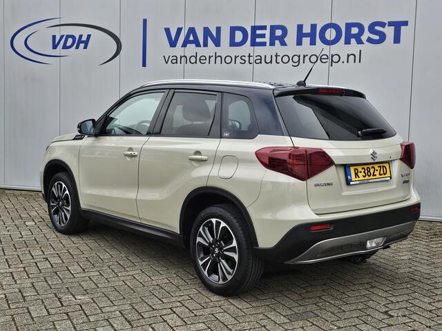 Suzuki VITARA 1.4-130pk Boosterjet Style Smart Hybrid. Uiterst nette en erg luxe Suzuki Vitara. Autm. airco, elektr. panodak, trekhaak+afneemb. kgl, stoelverw., adapt. cruise cntrl., metallic lak, navigatie, LM wielen, telefoonvoorb., Apple carplay/Android auto, LED v