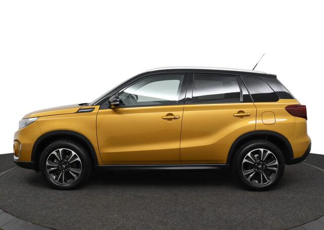 Suzuki VITARA 1.4 Boosterjet Style Smart Hybrid | Achteruitrijcamera | Trekhaak | Cruise | Clima | Mistlampen | Centrale deurvergrendeling | Panorama dak |