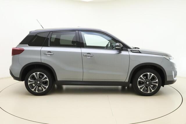 Suzuki VITARA 1.4 Boosterjet Style Smart Hybrid 129pk | Panoramadak | Trekhaak | Climate Control | Cruise Control Adaptief | Camera | Stoelverwarming | Navigatie | Parkeersensoren