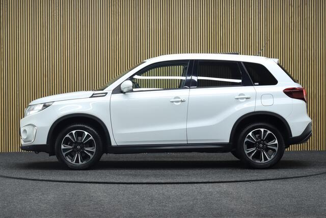 Suzuki VITARA 1.4 Boosterjet Style Smart Hybrid | Elek. Glazen Panoramadak | Leder-Alcantara | Adaptive-cruise | Camera | Clima | Parkeerhulp | Apple Carplay & Android Auto | Navigatie | Keyless | Stoelverwarming | Dodehoekdetectie