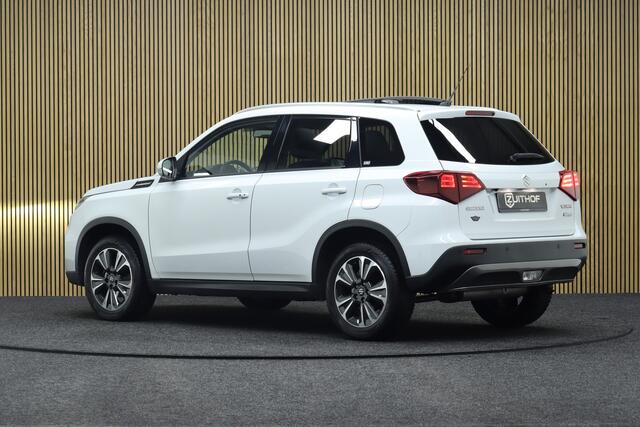 Suzuki VITARA 1.4 Boosterjet Style Smart Hybrid | Elek. Glazen Panoramadak | Leder-Alcantara | Adaptive-cruise | Camera | Clima | Parkeerhulp | Apple Carplay & Android Auto | Navigatie | Keyless | Stoelverwarming | Dodehoekdetectie