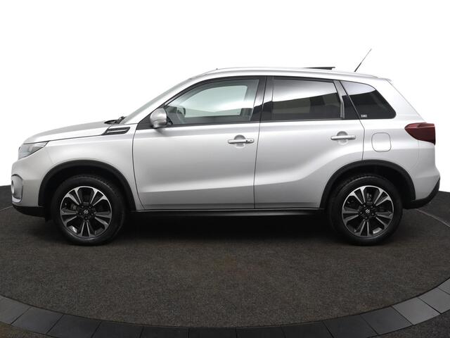 Suzuki VITARA 1.4 Boosterjet Style Smart Hybrid | Climate control | Cruise control adaptive | Navigatie | Apple car play, Android auto | Stoelverwarming | Trekhaak | Panoramadak |