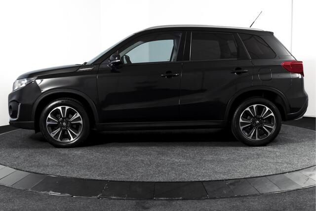 Suzuki VITARA 1.4 Boosterjet 140 PK Stijl Org. NL. | Afn. Trekhaak | Adapt. Cruise | Stoelverw. | PDC | Camera | NAV + App. Connect | ECC | LM 17" | – foto 5
