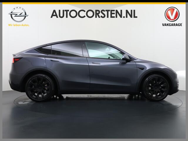 Tesla Model Y 514pk Long Range AWD 75kWh SOH 92% Matrix-Led Lmv 20" Warmtepomp Leer Navi Ecc Premium Audio Stoel+Stuurverwarming Autopilot 3.0 Adaptieve Cruise Memory Matrix Led Intel Atom® Processor Homelink 5 Achterbank verwarmd 4WD 1.600KG Trekvermogen tot 210kw DC 