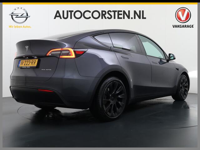 Tesla Model Y 514pk Long Range AWD 75kWh SOH 92% Matrix-Led Lmv 20" Warmtepomp Leer Navi Ecc Premium Audio Stoel+Stuurverwarming Autopilot 3.0 Adaptieve Cruise Memory Matrix Led Intel Atom® Processor Homelink 5 Achterbank verwarmd 4WD 1.600KG Trekvermogen tot 210kw DC 