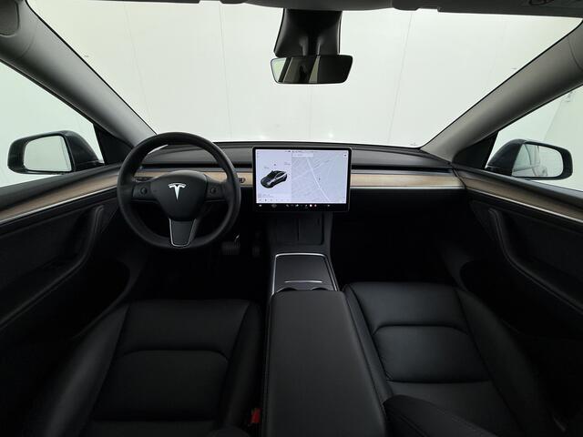 Tesla Model Y 514pk Long Range AWD 75kWh SOH 92% Matrix-Led Lmv 20" Warmtepomp Leer Navi Ecc Premium Audio Stoel+Stuurverwarming Autopilot 3.0 Adaptieve Cruise Memory Matrix Led Intel Atom® Processor Homelink 5 Achterbank verwarmd 4WD 1.600KG Trekvermogen tot 210kw DC 