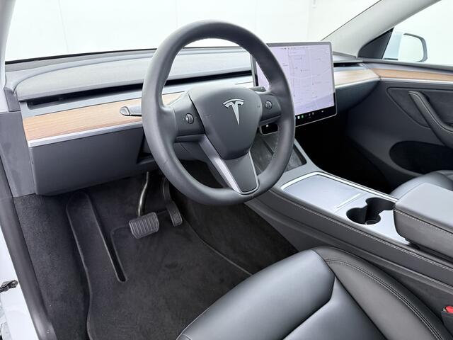 Tesla Model Y RWD Warmtepomp LFP-Accu Leer Lmv Camera's Pano-dak Adap.Cruise Navi Ecc Autopilot Stoel+Stuur+Achterbank Verwarming Elek.Achterklep Dodehoek detector Draadloze telefoonlader SOH 93% 1e Eigenaar Origineel Nederlandse Auto 1.600KG Trekgewicht