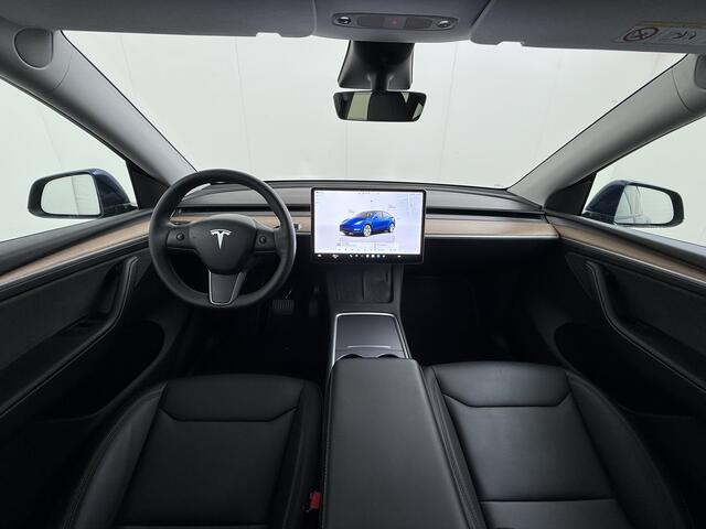Tesla Model Y Long Range AWD 514pk SOH 92% Trekhaak Warmtepomp Leder Panoramadak Matrix-LED Autopilot Elektr.Stuur+Stoel+Verwarmd Navi Ecc Premium Audio Keyless Priv.Glass Camera's Elektr.AchterKlep Parkeer Assistent Sentry-Mode Privacyglas Bluetooth Dodehoek detector 