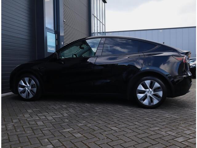 Tesla Model Y Long Range AWD 75 kWh | 94.4% SOH | Pano | Autopilot | Leer | Stoel, Stuur en Achterbank verwarmd