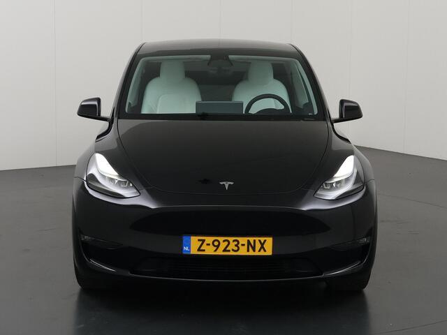 Tesla Model Y Long Range AWD 75 kWh | SOH 94% | Full Self Driving Capability* | Stoelverwarming voor + achter | Adaptieve Cruise Control | Camera | Panoramadak | Ele. stoelen + geheugen | Ele. kofferdeksel | NL Auto |