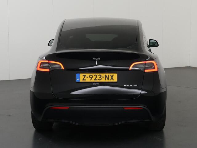 Tesla Model Y Long Range AWD 75 kWh | SOH 94% | Full Self Driving Capability* | Stoelverwarming voor + achter | Adaptieve Cruise Control | Camera | Panoramadak | Ele. stoelen + geheugen | Ele. kofferdeksel | NL Auto |