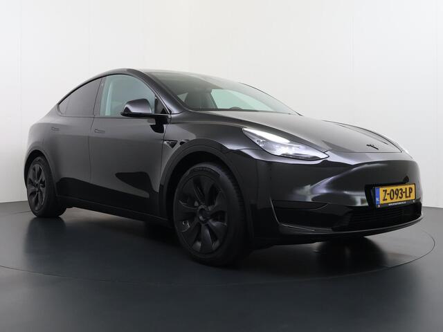 Tesla Model Y RWD 58 kWh AFNEEMBARE TREKHAAK | FABRIEKSGARANTIE OP ACCU & AANDRIJFLIJN TOT 03-2031 OF 160.000 KM | CARBON LIJSTEN |