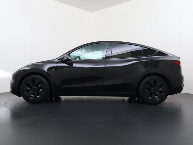 Tesla Model Y RWD 58 kWh AFNEEMBARE TREKHAAK | FABRIEKSGARANTIE OP ACCU & AANDRIJFLIJN TOT 03-2031 OF 160.000 KM | CARBON LIJSTEN |