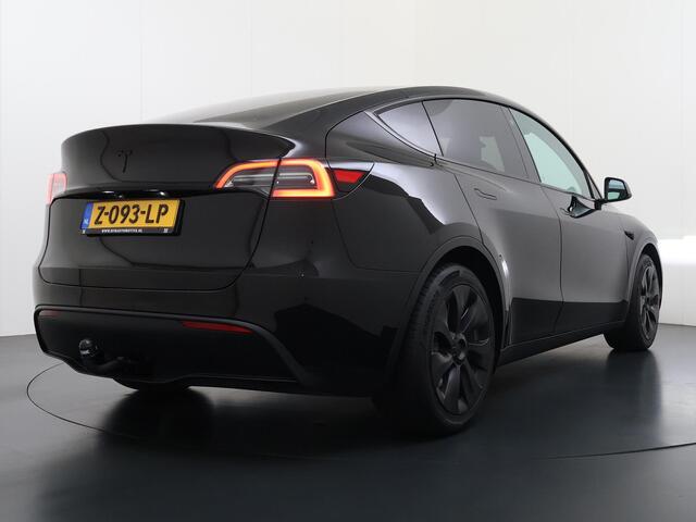 Tesla Model Y RWD 58 kWh AFNEEMBARE TREKHAAK | FABRIEKSGARANTIE OP ACCU & AANDRIJFLIJN TOT 03-2031 OF 160.000 KM | CARBON LIJSTEN |