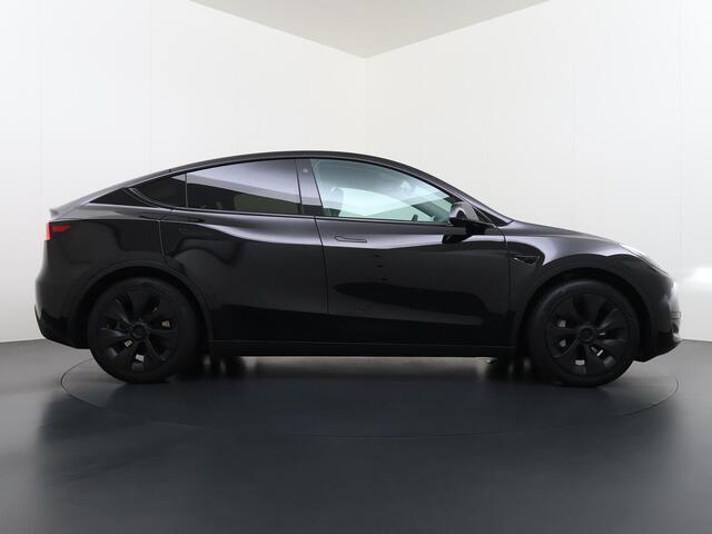 Tesla Model Y RWD 58 kWh AFNEEMBARE TREKHAAK | FABRIEKSGARANTIE OP ACCU & AANDRIJFLIJN TOT 03-2031 OF 160.000 KM | CARBON LIJSTEN |