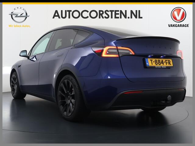 Tesla Model Y RWD 300PK LFP Accu Trekhaak Spoiler 20"lm Warmtepomp Leer PanoDak Navi Premium-Audio Ecc Adap.Cruise Camera's Traffic-Aware-Cruise+Sturen AI FSD-3 Computer SOH 92% Stuur+Stoelverwarming Led Traffic-Aware Cruise Control Toybox Elek.Achterklep 1.600KG Trek