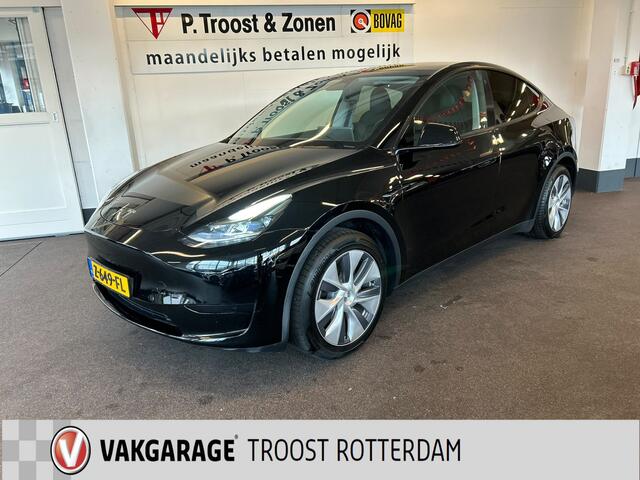 Tesla Model Y RWD 58 kWh Nederlandse auto | Panoramadak | Afneembare trekhaak | Stoelverwarming | Achteruitrijcamera | Parkeersensoren rondom | Lederen bekleding