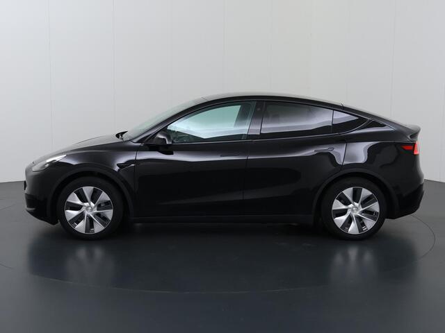 Tesla Model Y RWD 58 kWh | Panoramadak | 360° Camera | Stoelverwarming | Keyless Entry/Go | Elek. Stoelen | Climate Control | Elek. Achterklep |