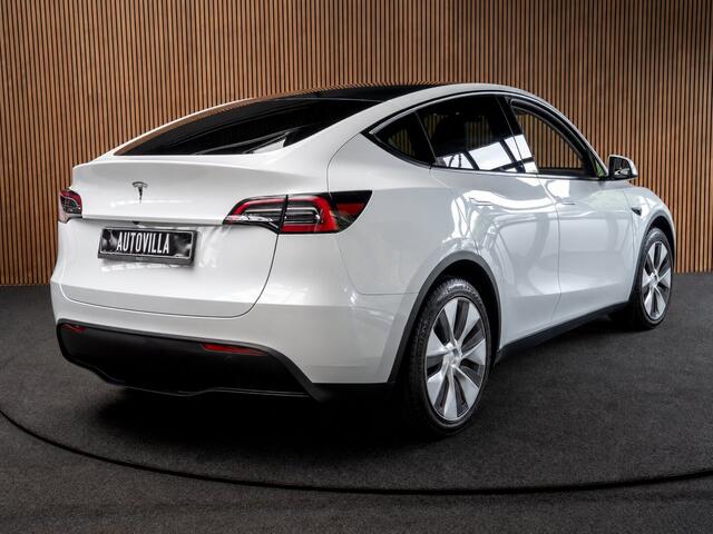 Tesla Model Y Long Range Dual Motor AWD 351pk Navi Camera Leer Warmtepomp ACC Autopilot PDC Elektr. achterklep Stoelverwarmimg voor en achter Stuurverwarming BTW auto SoH is 93,6%