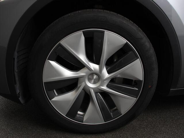 Tesla Model Y Long Range AWD 75 kWh Climate control Adaptieve cruise control Achteruitrijcamera Panoramadak Keyless Stuurverwarming Stoelverwarming LED Navigatie Parkeersensoren