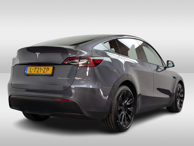 Tesla Model Y Long Range AWD 75 kWh / SoH 90,9% / Trekhaak / Autopilot / Panoramadak / Camera / 20'' / Keyless / Leder / Dodehoek / Navigatie / Stoelverwarming