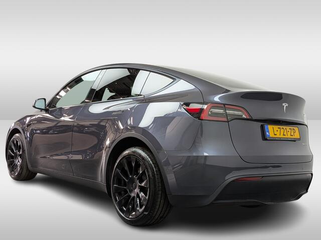 Tesla Model Y Long Range AWD 75 kWh / SoH 90,9% / Trekhaak / Autopilot / Panoramadak / Camera / 20'' / Keyless / Leder / Dodehoek / Navigatie / Stoelverwarming