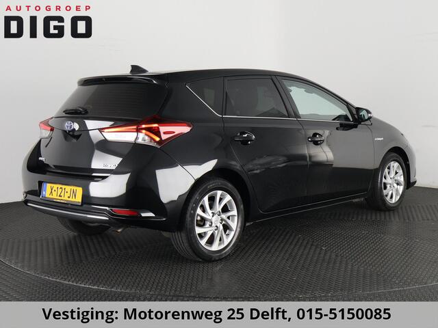 Toyota AURIS 1.8 HYBRIDE EXECUTIVE AUTOMAAT GARANTIE 2029! CAMERA.STOELVERWARMING . NAVIGATIE . CRUISE CONTROL .