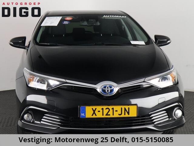 Toyota AURIS 1.8 HYBRIDE EXECUTIVE AUTOMAAT GARANTIE 2029! CAMERA.STOELVERWARMING . NAVIGATIE . CRUISE CONTROL .