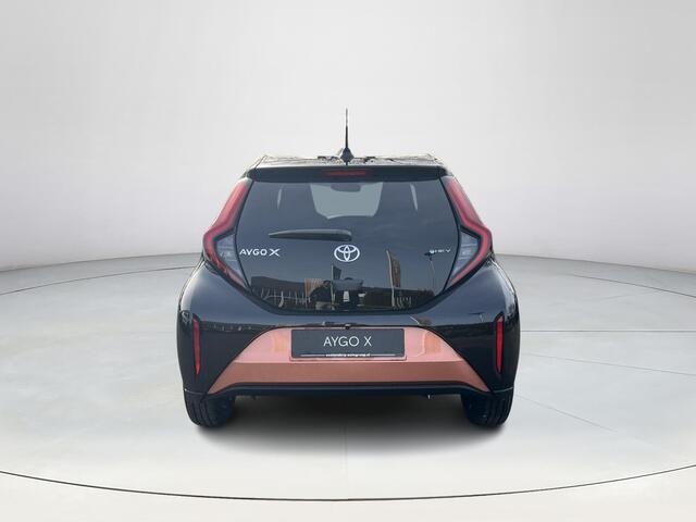 Toyota AYGO X Hybrid 115 pulse | Cinnamon met zwart dak | Nieuw uit voorraad leverbaar |