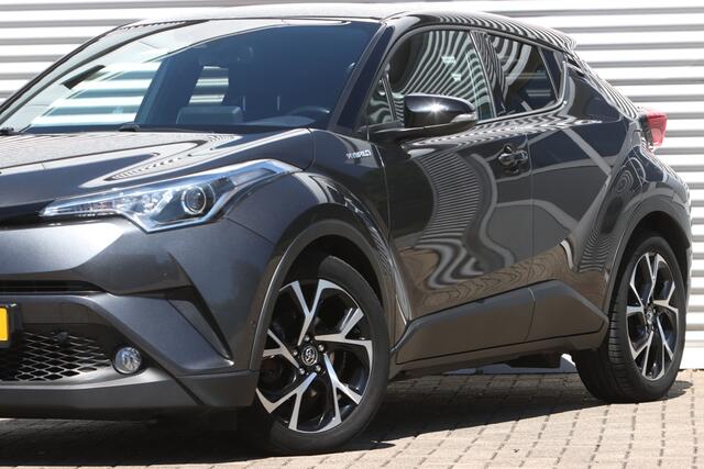 Toyota C-HR 1.8 Hybrid Executive Bi-Tone JBL / Leer