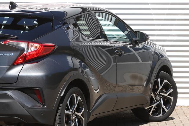 Toyota C-HR 1.8 Hybrid Executive Bi-Tone JBL / Leer