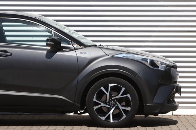 Toyota C-HR 1.8 Hybrid Executive Bi-Tone JBL / Leer