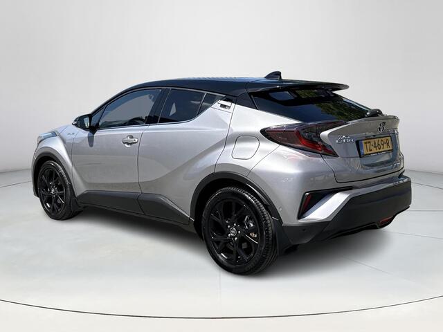 Toyota C-HR 1.8 Hybrid Bi-Tone **NAVIGATIE/ JBL / DODE HOEK SENSOR / STUUR- EN STOELVERWARMING/ 36 MAANDEN GARANTIE**