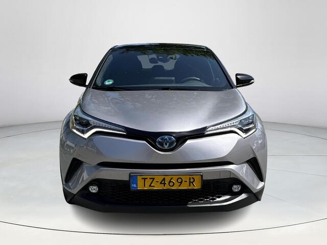 Toyota C-HR 1.8 Hybrid Bi-Tone **NAVIGATIE/ JBL / DODE HOEK SENSOR / STUUR- EN STOELVERWARMING/ 36 MAANDEN GARANTIE**