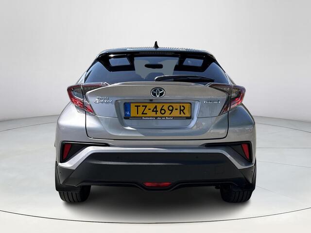 Toyota C-HR 1.8 Hybrid Bi-Tone **NAVIGATIE/ JBL / DODE HOEK SENSOR / STUUR- EN STOELVERWARMING/ 36 MAANDEN GARANTIE**