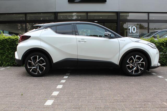 Toyota C-HR 1.8 Hybrid Dynamic Bi-Tone | Rijklaar | Apple/Android | Trekhaak | Navi | Clima | Stoel/Stuur-verwarming | PDC | Cruise