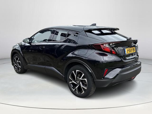 Toyota C-HR 1.8 Hybrid First Edition **NAVIGATIE/ DODEHOEK DETECTIE/ STOELVERWARMING/ GARANTIE**