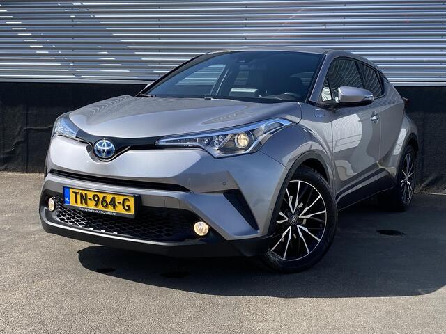 Toyota C-HR 1.8 Hybrid Bi-Tone Plus Trekhaak, dodehoek detectie, navigatie, stoel- & stuurverwarming, achteruitrij camera, parkeersensoren, lederen bekleding, Volledig dealeronderhouden